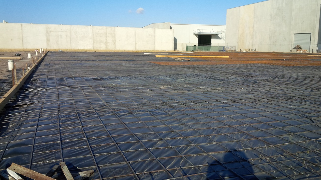 Black polythene on concrete formwork site